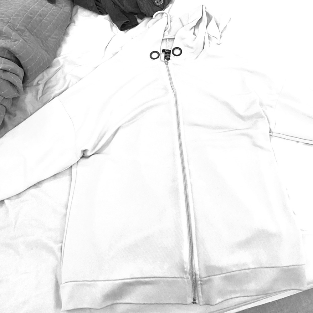 white zip up jacket